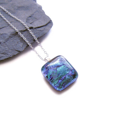 Blue Green Ripples Fused Glass Pendant. Small necklace handmade in dichroic fused glass. Man's or woman's pendant. Made in the north-east of England.