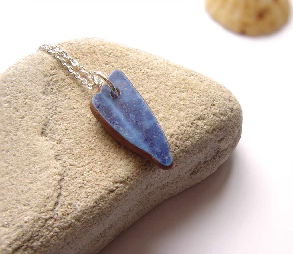 Blue Patterned Sea Pottery Pendant handmade in a piece of antique sea-washed tile gathered on the Northumbrian coast of England.