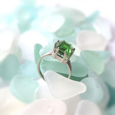 Handcrafted green Northumbrian sea glass ring; faceted English sea glass set in a contemporary silver ring with an 8 prong setting