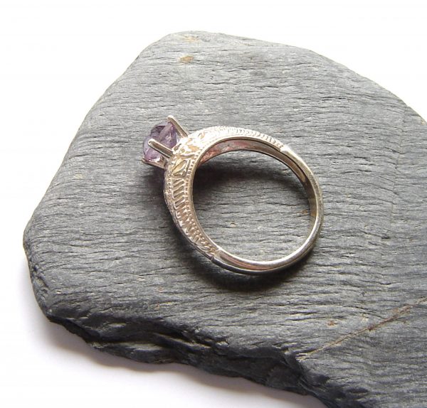 Purple gemstone engagement or dress ring