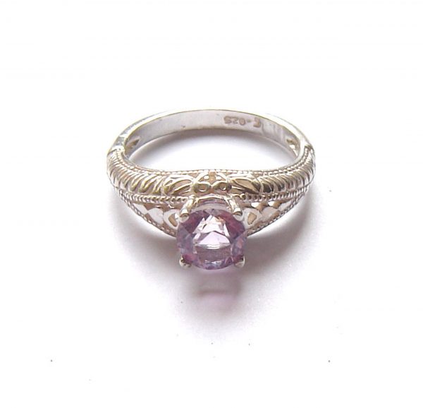 Purple gemstone engagement or dress ring