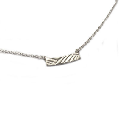 Fields and Sky Silver Necklace in an original design inspired by northern England's ancient landscapes, 'rig and 'furrow' fields. Handmade in the UK.