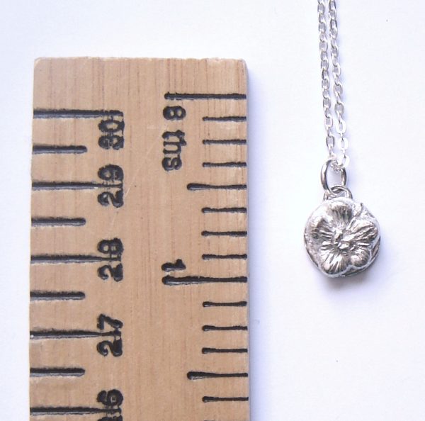 Small handmade wildflower pendant