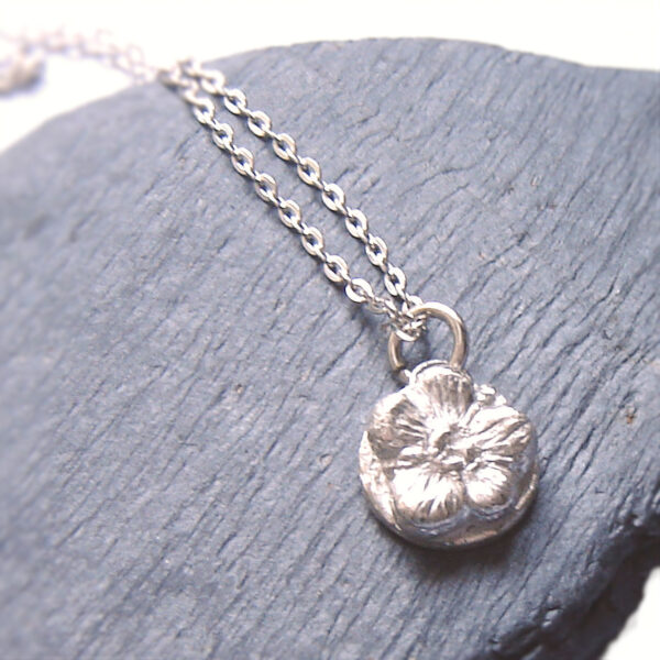 Forget-me-not silver necklace. Small handmade silver wildflower pendant
