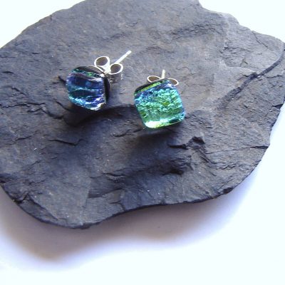 Leafy Green Dichroic Fused Glass Stud Earrings in bright green textured glass tinged with blue.