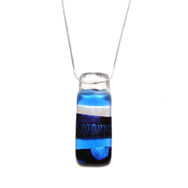 Blues and Swirls Layered Dichroic Pendant. A large, abstract statement pendant handmade in alternating plain and patterned dichroic fused glass, the colours varying in different lights. Made in England.