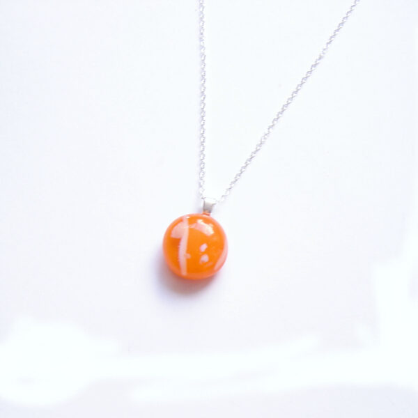 Organic Style Orange Fused Glass Necklace. Handmade small round glass pendant from Northumbria Gems.