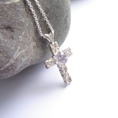 Textured silver cross necklace set with handcrafted purple amethyst gemstone