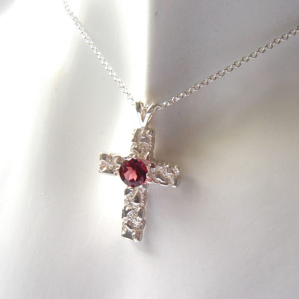 Natural Red Garnet Cross Necklace. Textured silver cross necklace handcrafted in garnet gemstone.