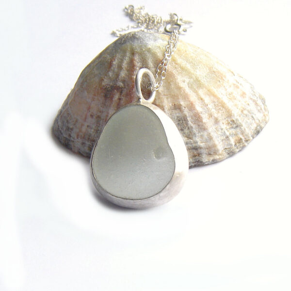 Seafoam White Sea Glass Silver Bezel Necklace. Handmade in the north-east of England by Northumbria Gems.