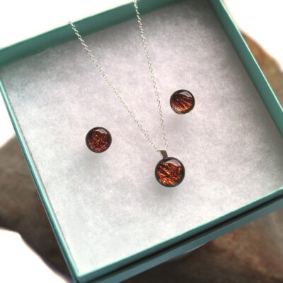 Sunburst Orange Gift Set I. Small Fused Glass necklace and earrings handmade in a flame-coloured, orange textured dichroic fused glass. Fused glass jewellery set from Northumbria Gems.