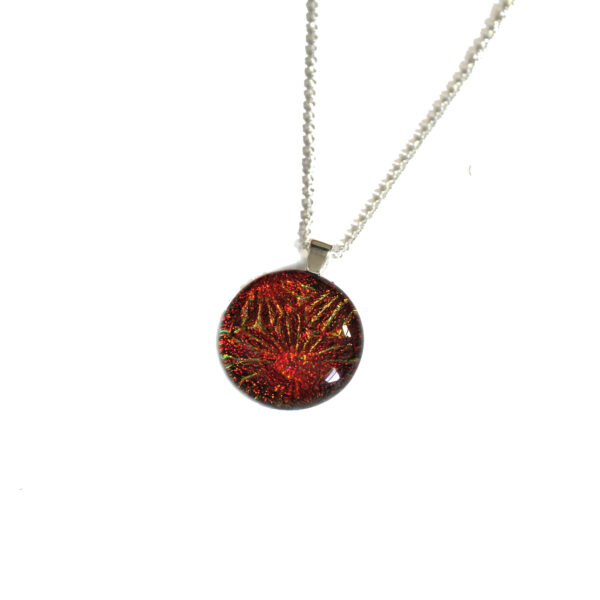 Sunburst Orange Dichroic Pendant handmade in flame-coloured, textured dichroic fused glass, in sterling silver. Elements inspired necklace handmade in Northumbria, England.