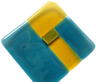 Teal and Amber Small Fused Glass Dish. Square dish in a geometric design of teal, dark amber and dichroic gold glass. Ring or trinket dish handmade in England