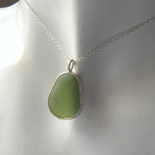 Man's or woman's green sea glass bezel pendant