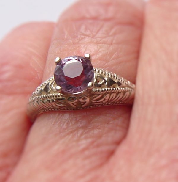 Purple gemstone engagement or dress ring