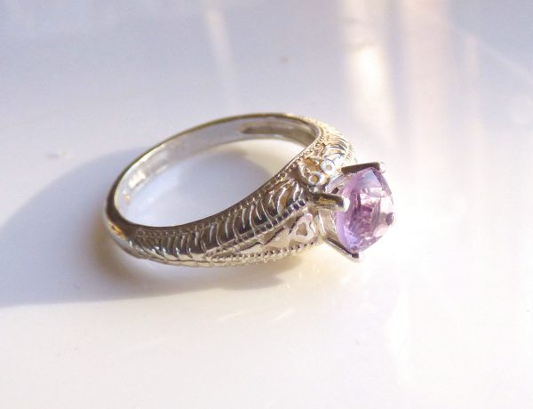 Purple gemstone engagement or dress ring