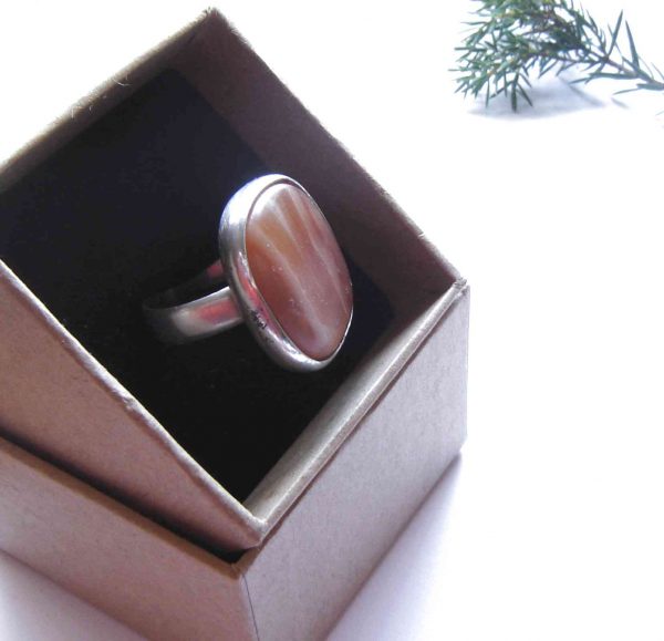 Large handcrafted orange carnelian gemstone ring.