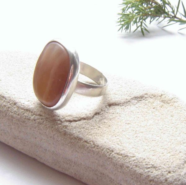Large, handcrafted carnelian agate gemstone ring in sterling silver.