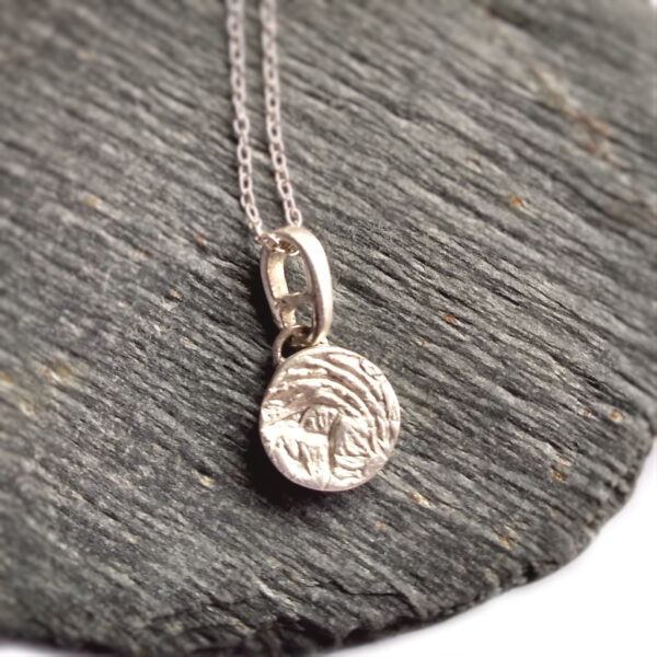 Coastal Scene Silver Necklace, tiny round pendant handmade in ethical silver by Northumbria Gems.